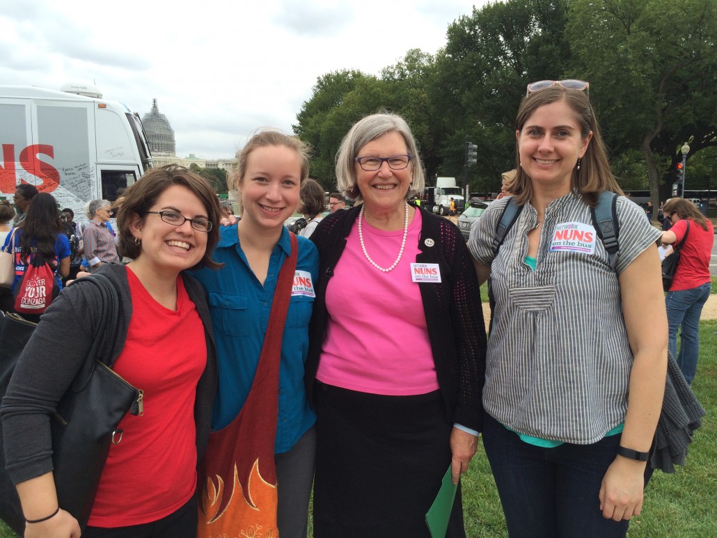 Staff Associates Emily Harder, Elizabeth Hardt, and Mallory Naake with NETWORK Executive Director Sr. Simone Campbell