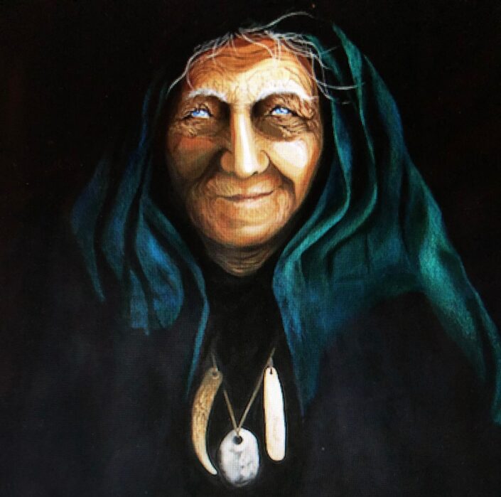 A painting of the Cailleach depicted as an old woman with bluegreen highlighted hair, many wrinkles on her face, cataracts, wearing a necklace with pendants of a tooth or claw, a hagstone, and a bone.