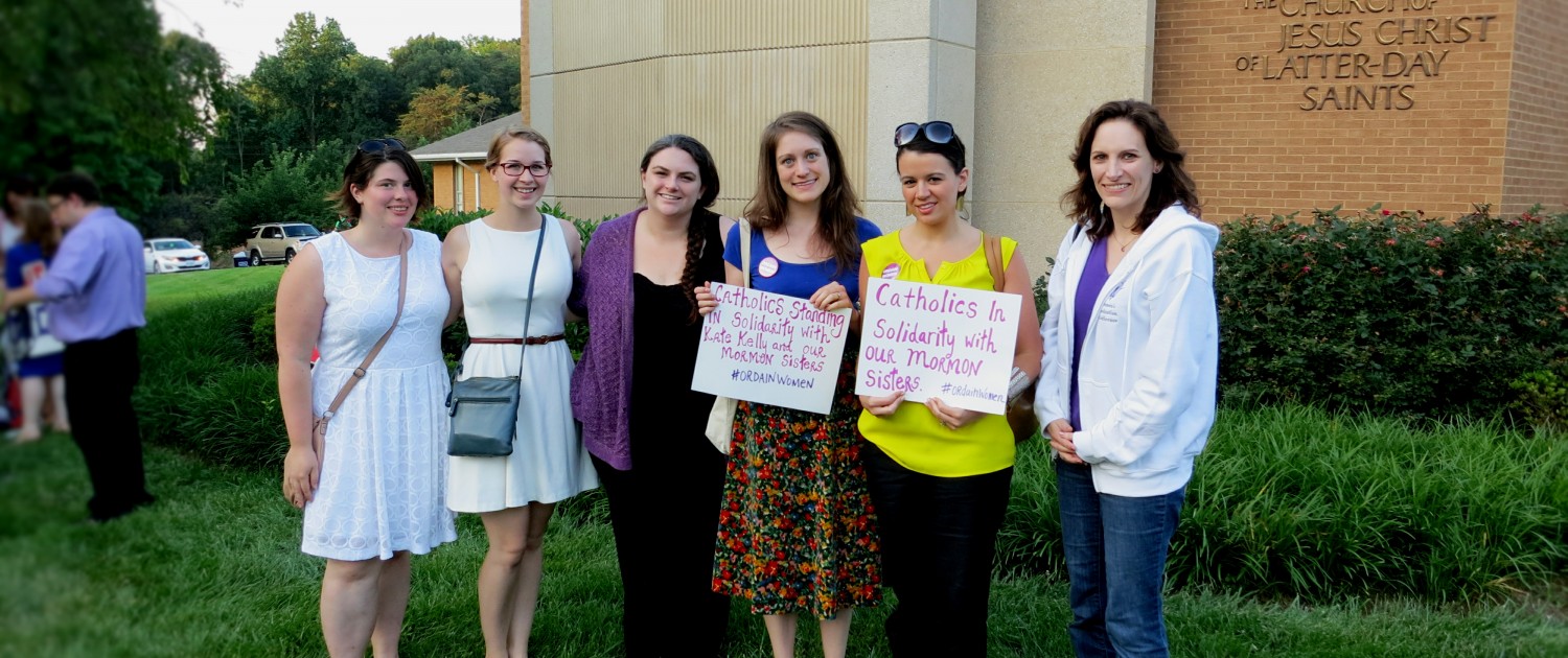 Representatives of WATER, Women's Ordination Conference, and Catholics for Choice stand in solidarity with Kate Kelly and Ordain Women. From Left to Right:  Katie Breslin of Catholics for Choice, Ciara Chivers and Cathy Jaskey of WATER, Kate Conmy, Erin Hanna, and Jeannette Mulherin of Women's Ordination Conference. 